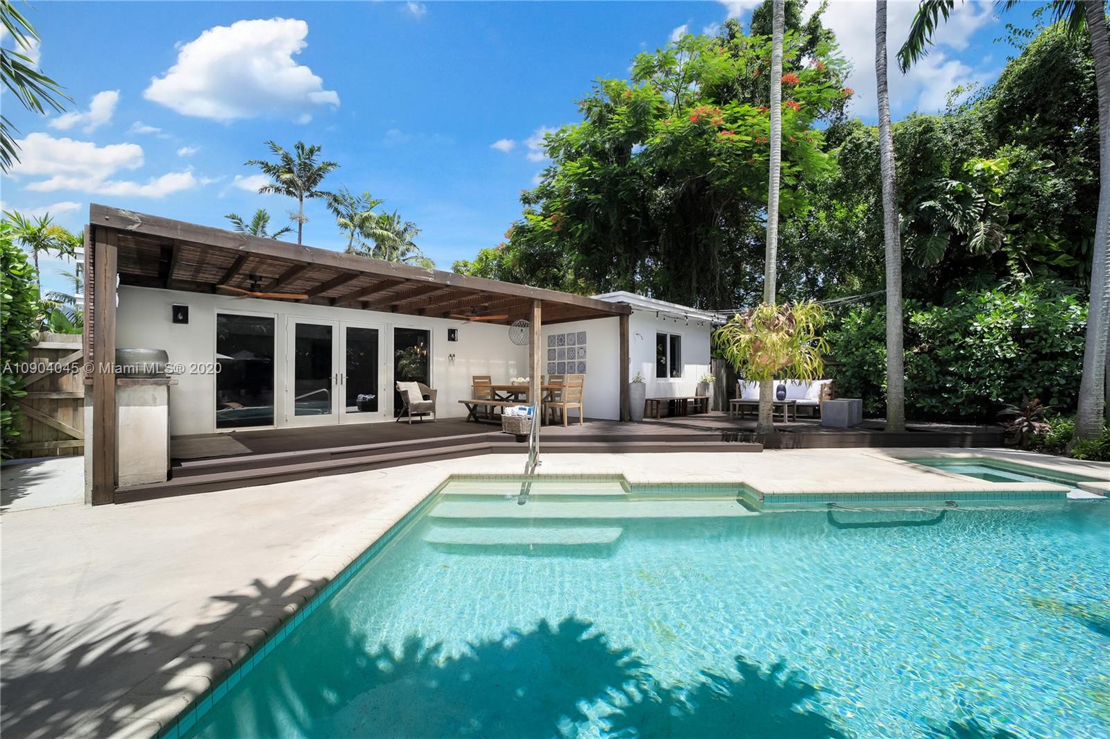 434 Southwest 30th Road Miami, FL 33129 - Photo 8 of 51 a view of a house with backyard and sitting area