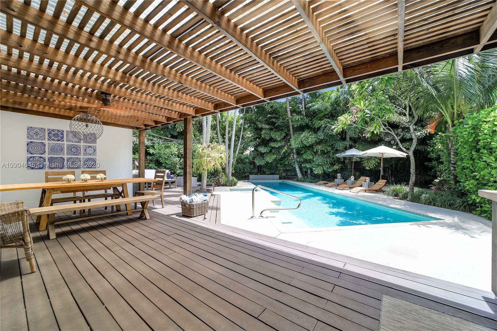 434 Southwest 30th Road Miami, FL 33129 - Photo 9 of 51 a view of a roof deck with couches and wooden floor