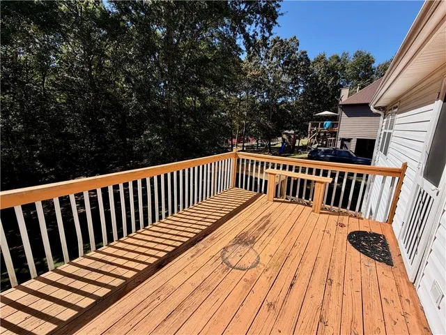 a view of a balcony with chairs