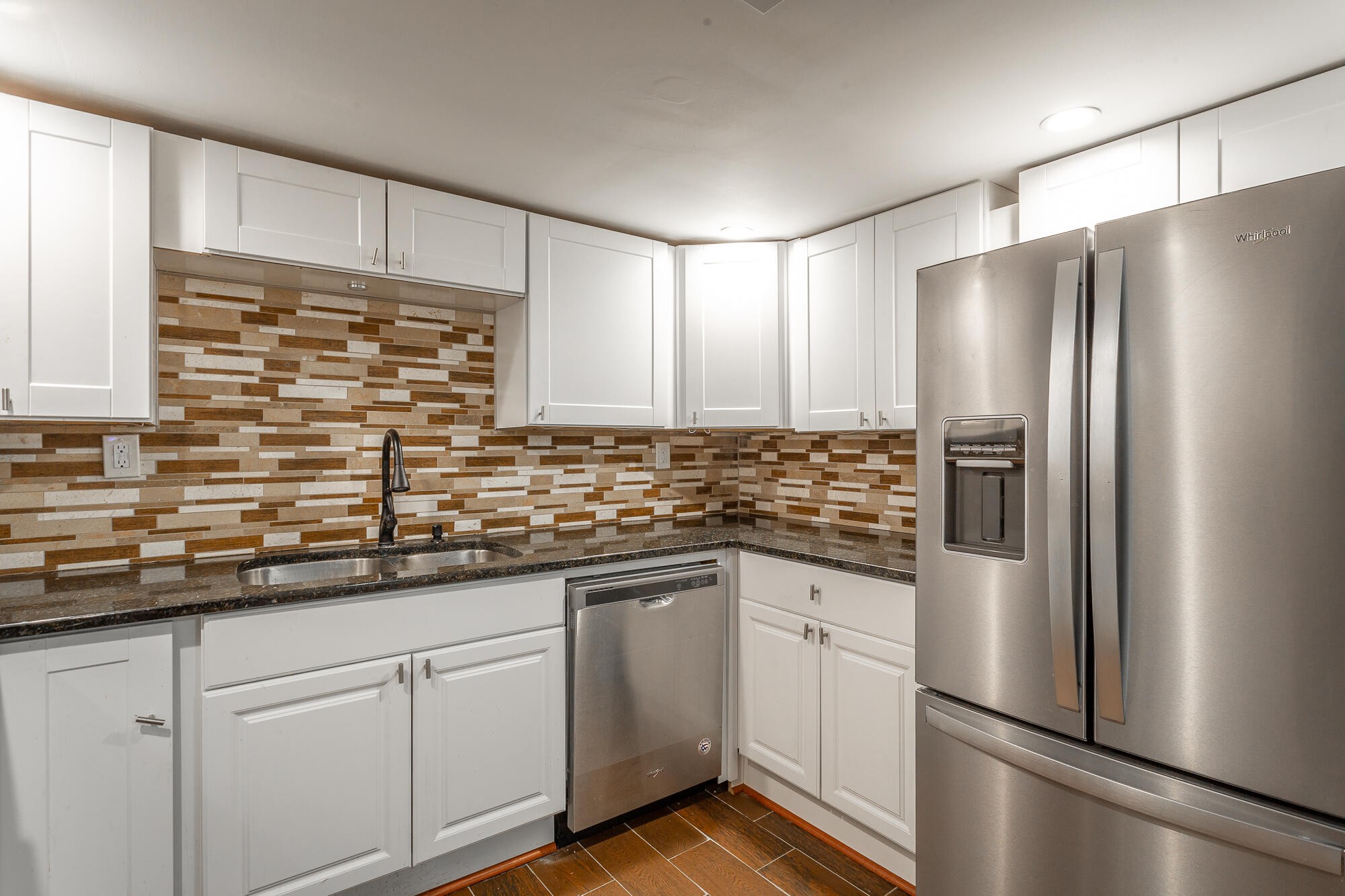 5401 Champion Road Chattanooga, TN 37416 - Photo 11 of 56 a kitchen with stainless steel appliances granite countertop a refrigerator and a sink