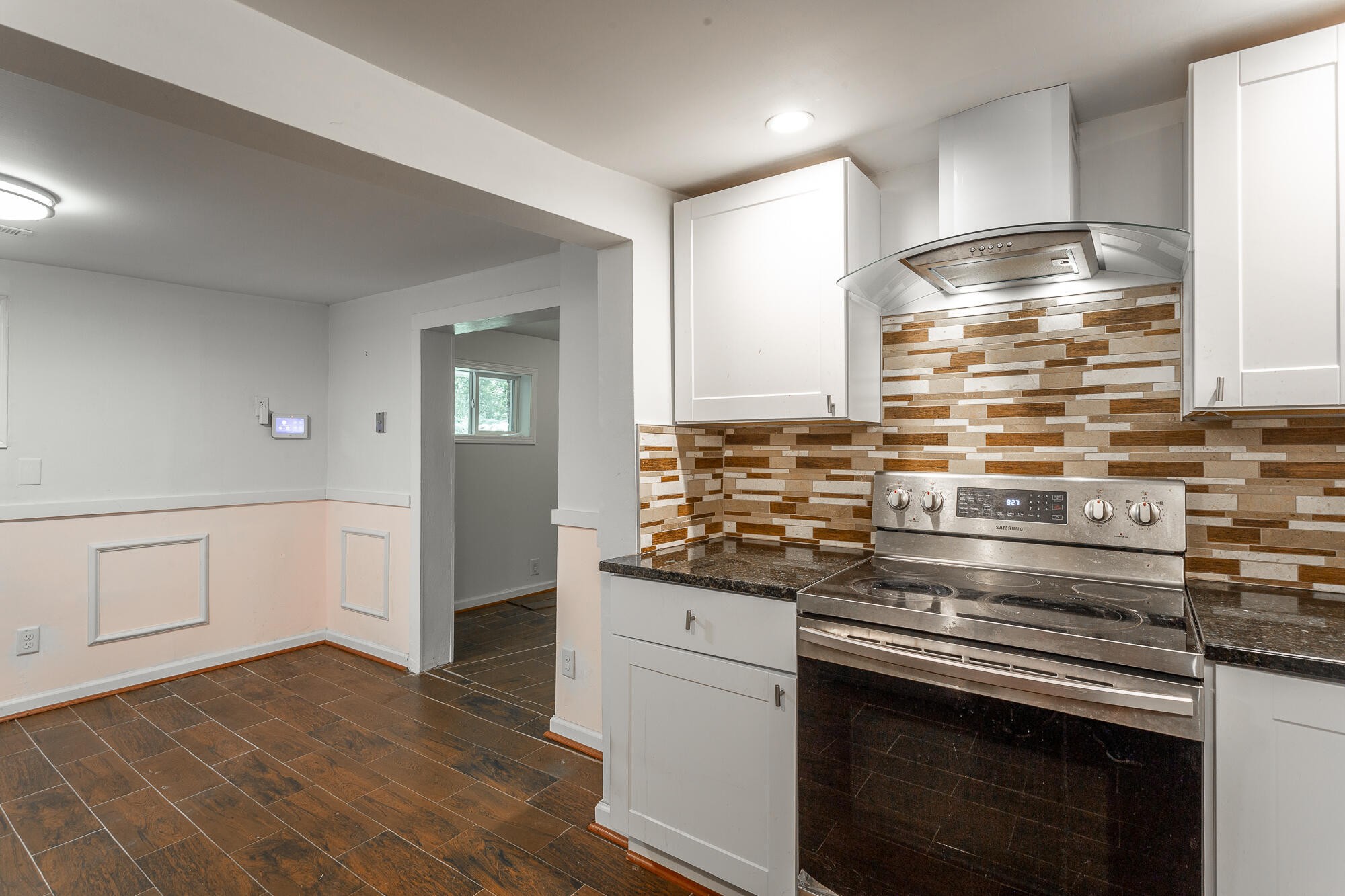 5401 Champion Road Chattanooga, TN 37416 - Photo 13 of 56 a kitchen with granite countertop a stove and a sink