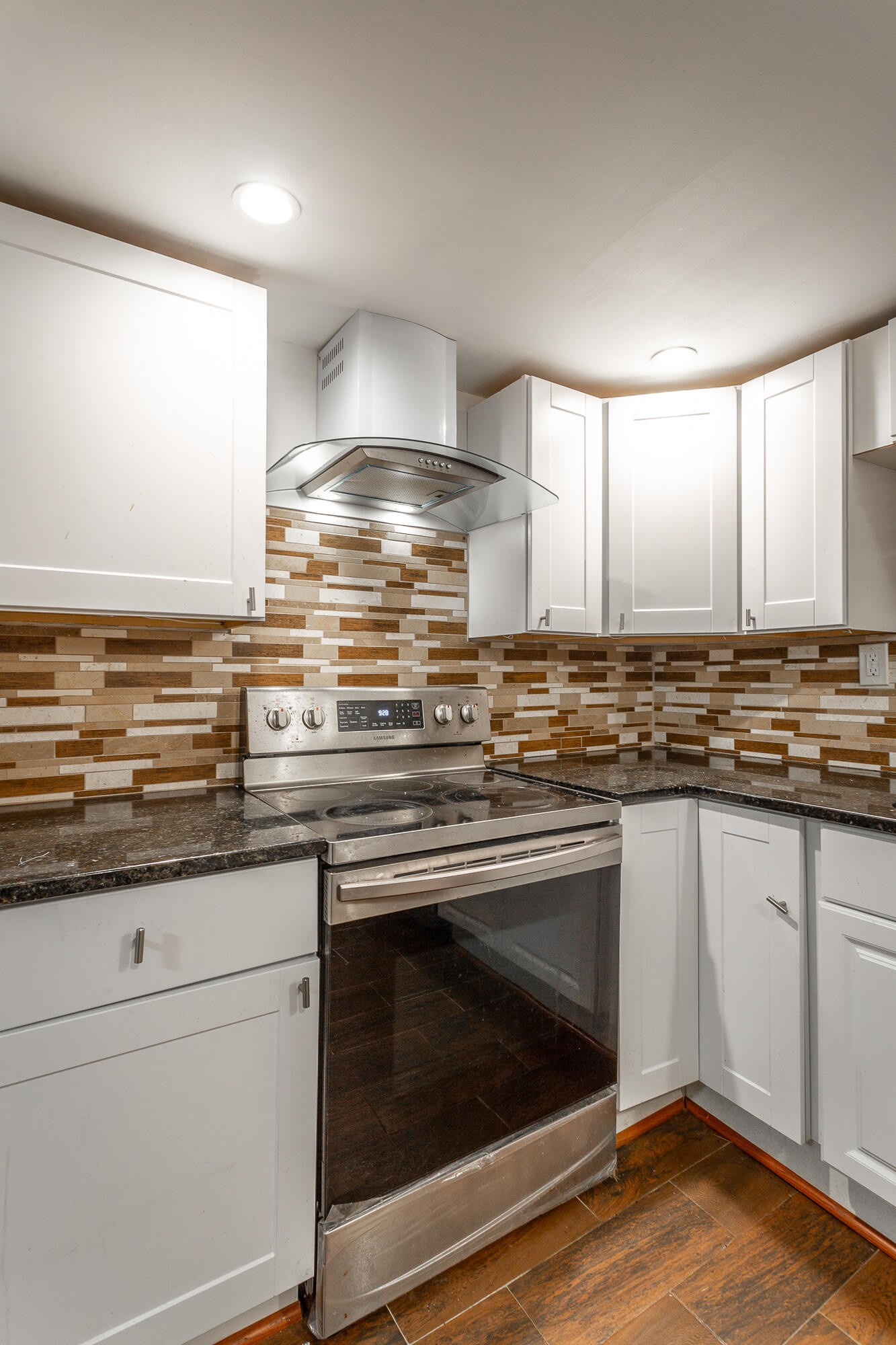5401 Champion Road Chattanooga, TN 37416 - Photo 15 of 56 a kitchen with stainless steel appliances granite countertop a stove and a sink