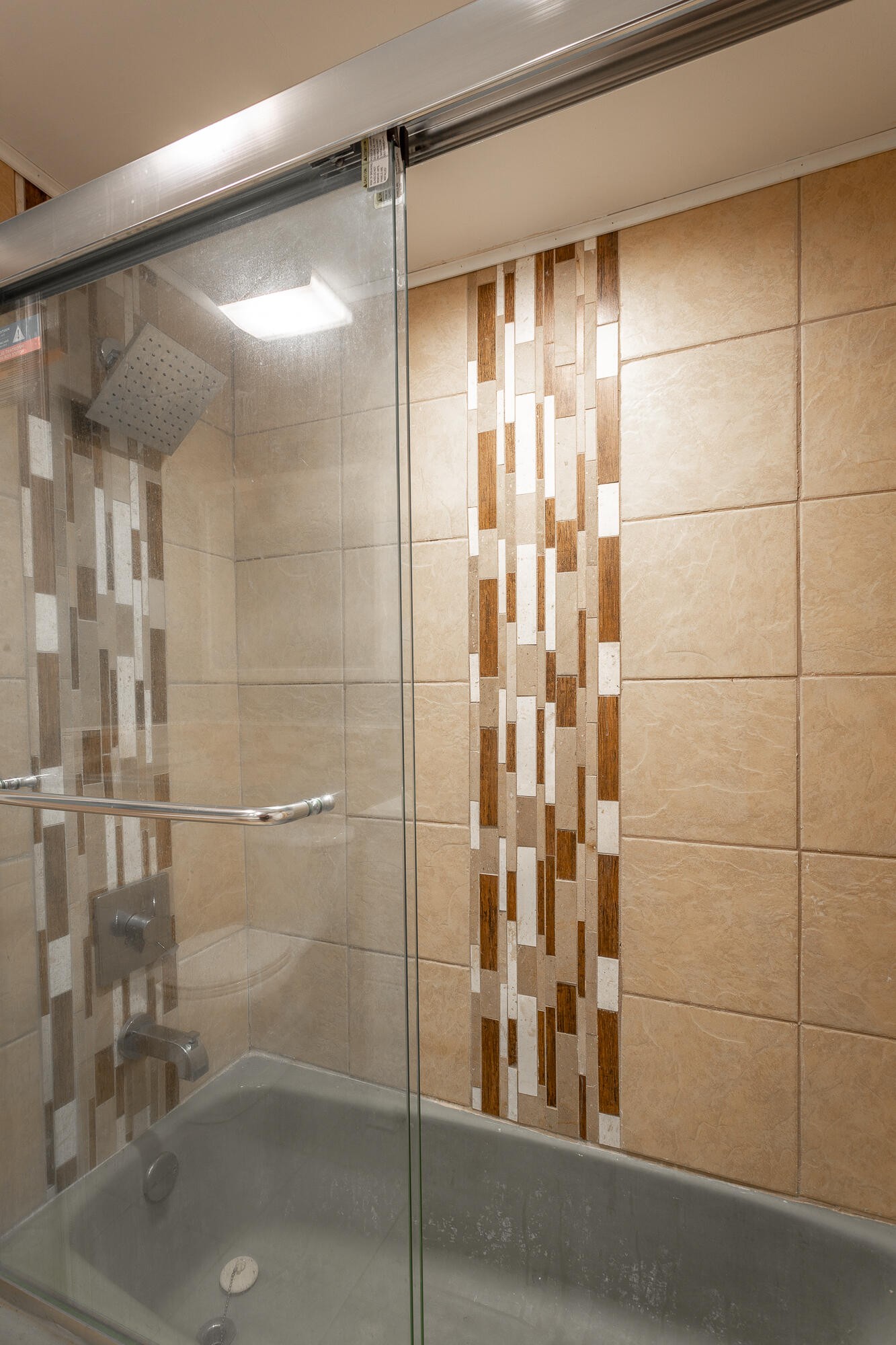 5401 Champion Road Chattanooga, TN 37416 - Photo 23 of 56 a bathroom with a glass shower door