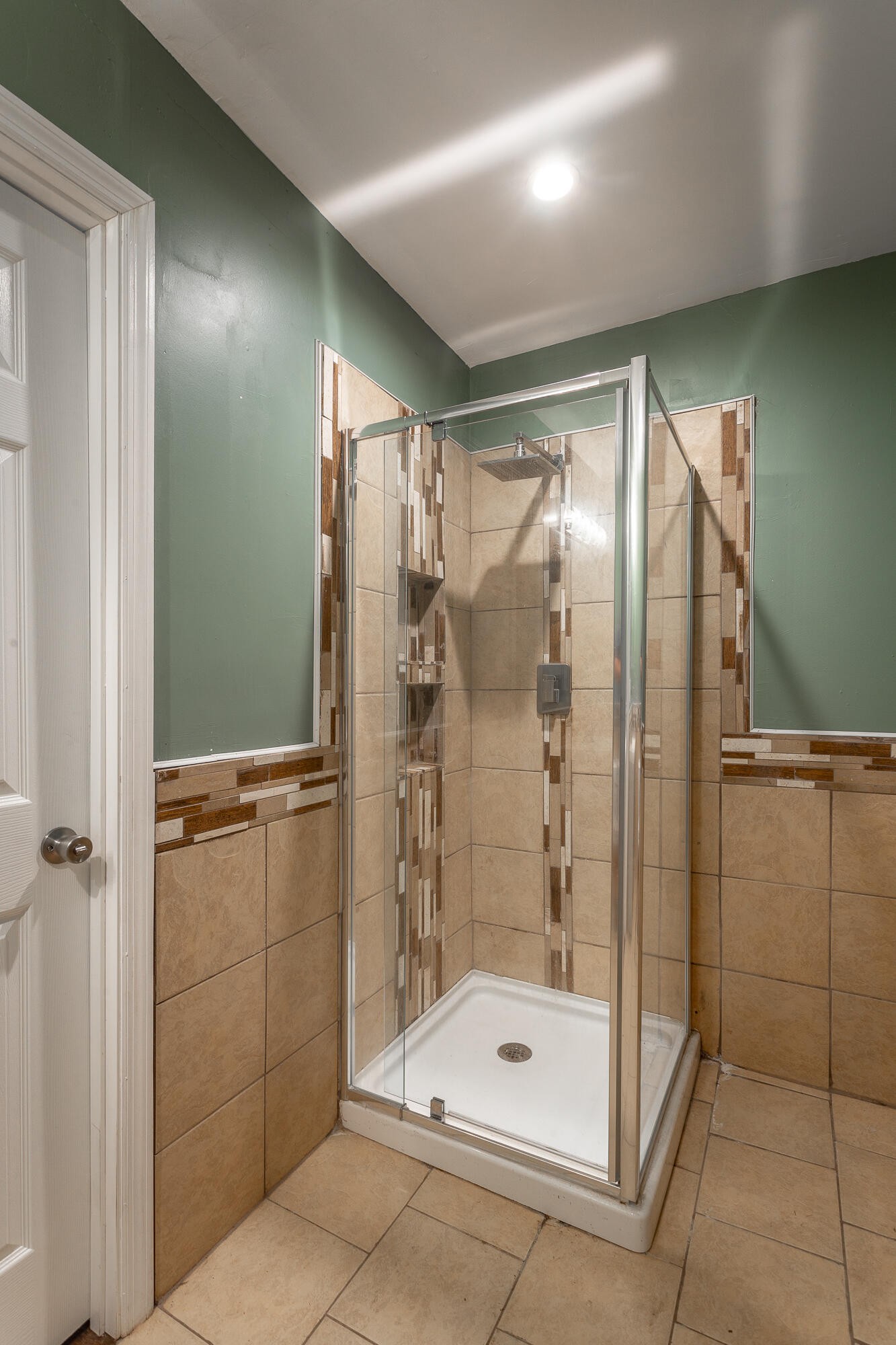 5401 Champion Road Chattanooga, TN 37416 - Photo 29 of 56 a bathroom with a shower and a glass door