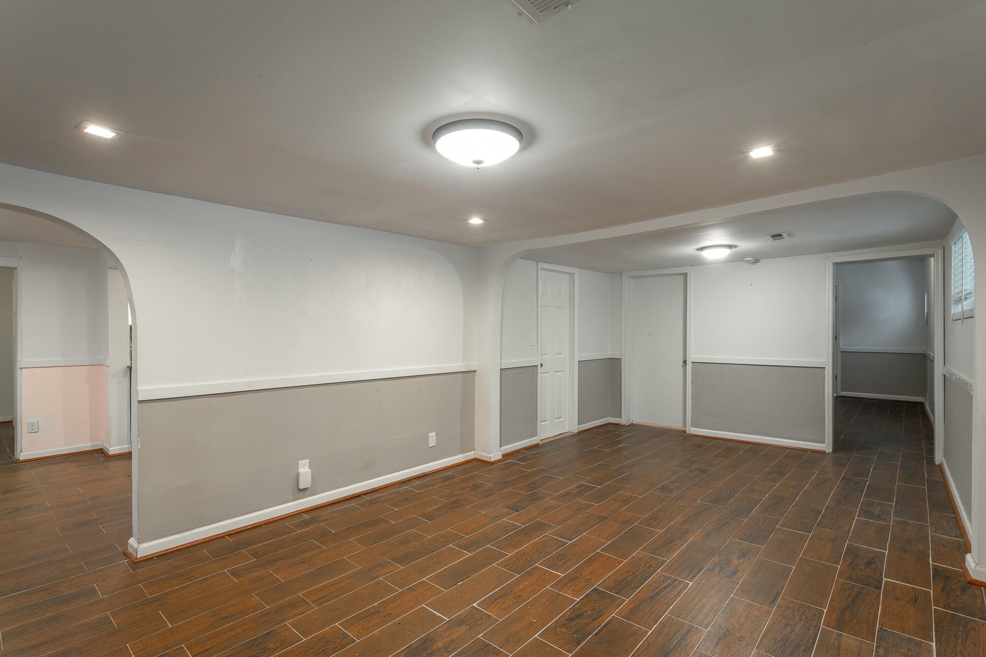 5401 Champion Road Chattanooga, TN 37416 - Photo 3 of 56 an empty room with wooden floor and windows