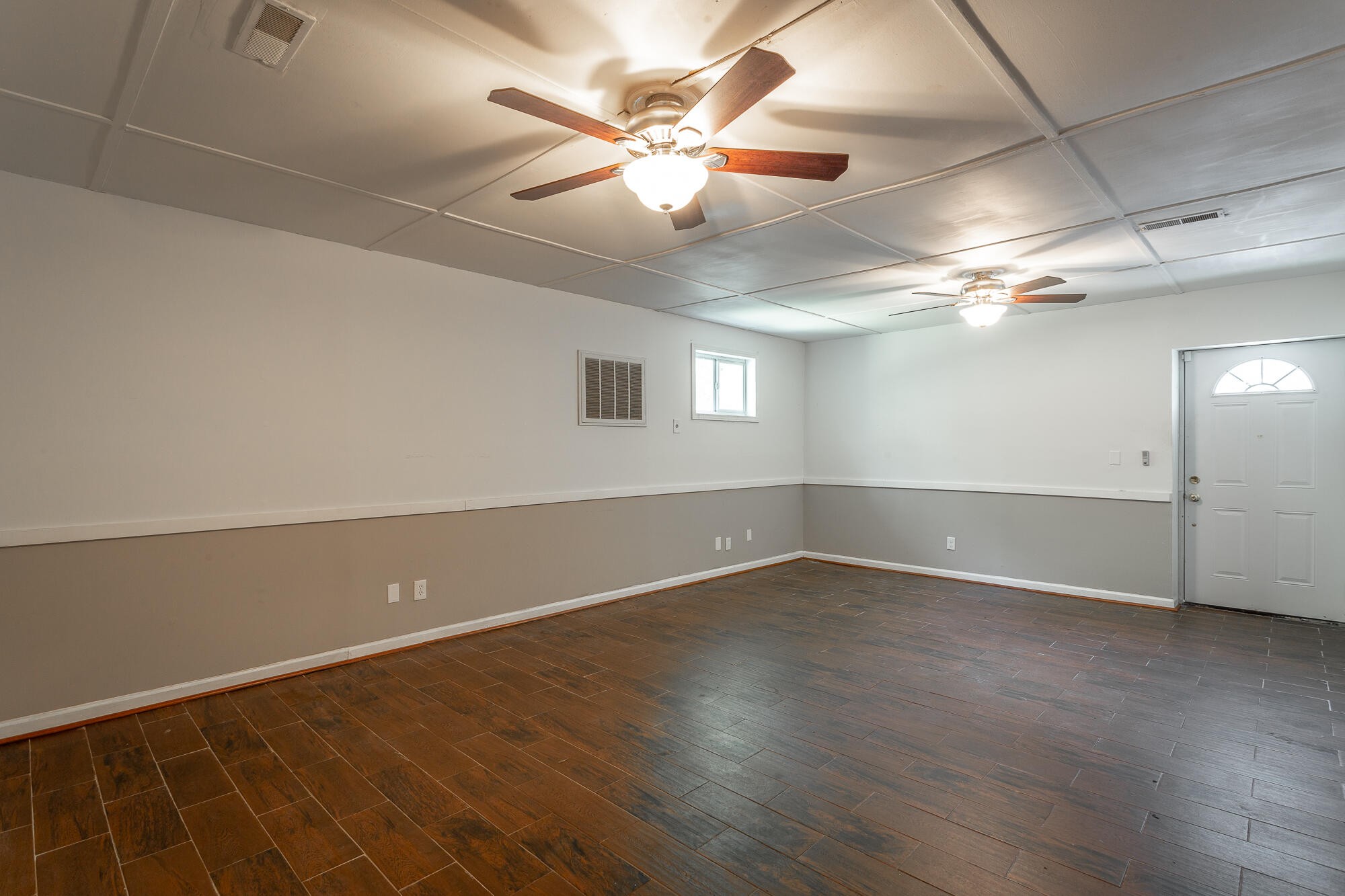 5401 Champion Road Chattanooga, TN 37416 - Photo 31 of 56 an empty room with wooden floor and windows