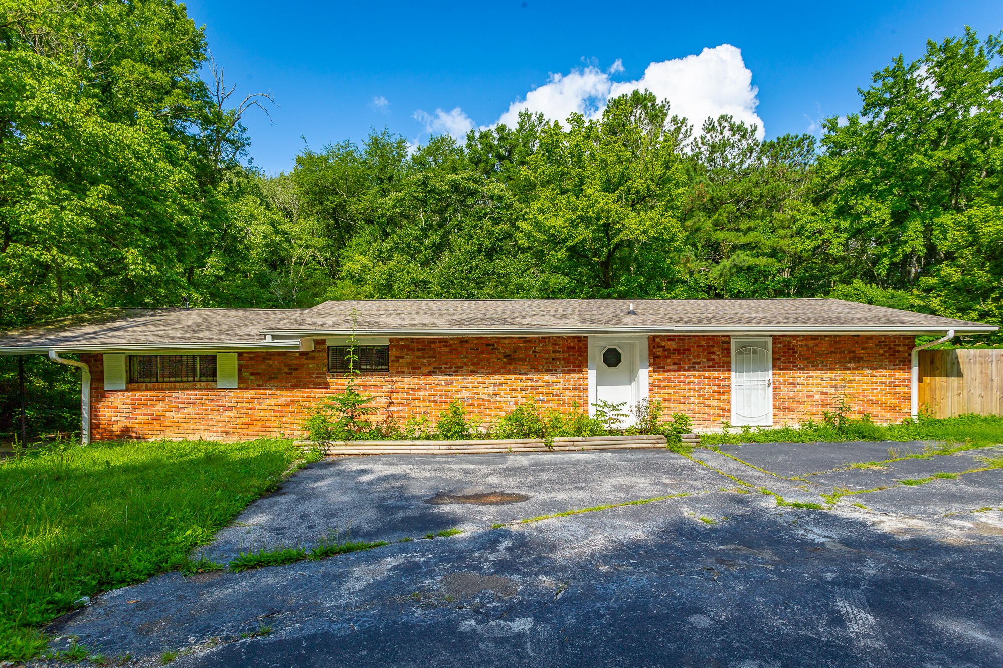 5401 Champion Road Chattanooga, TN 37416 - Photo 34 of 56 front view of a house with a yard