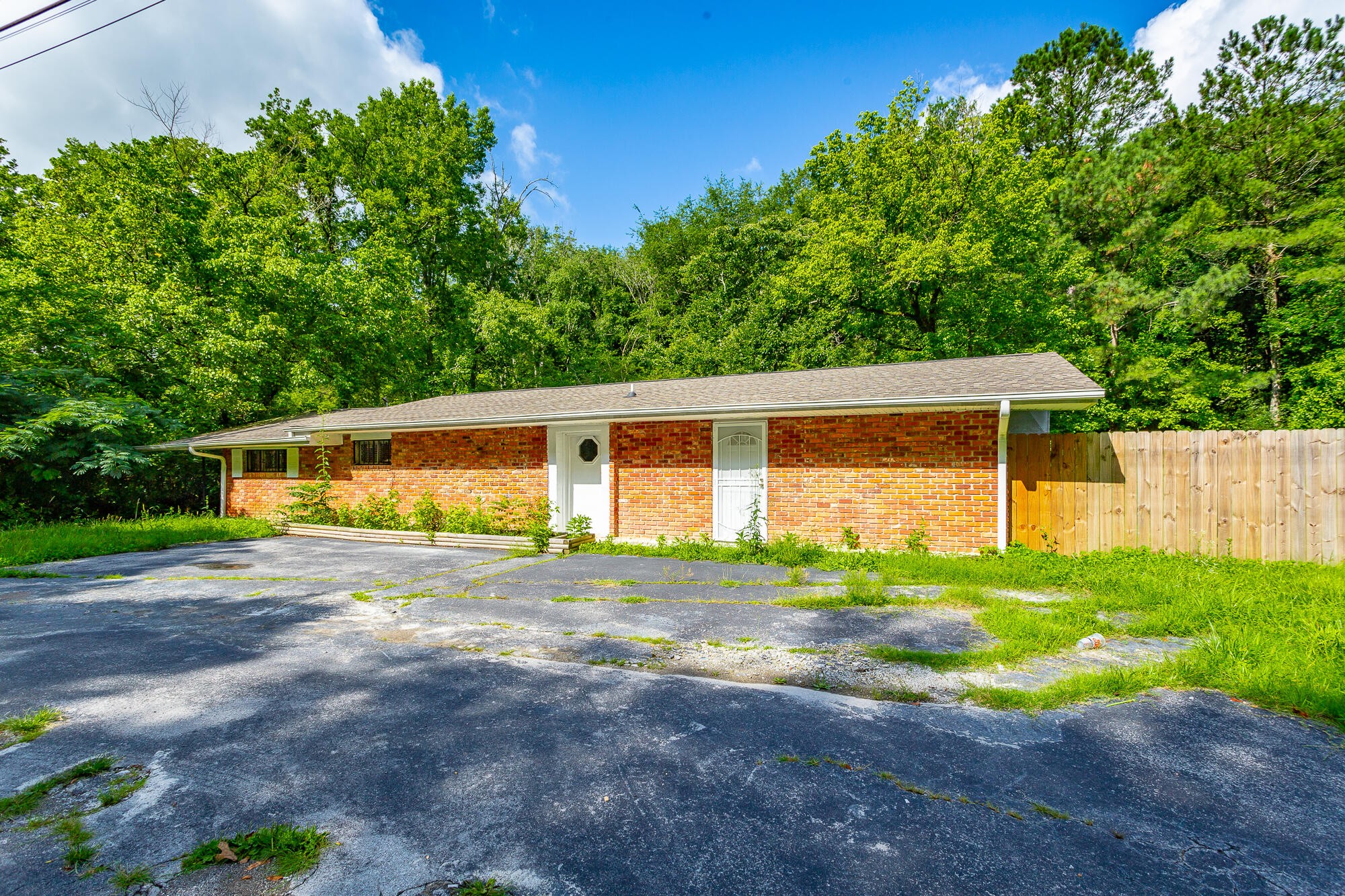 5401 Champion Road Chattanooga, TN 37416 - Photo 35 of 56 a front view of house with yard and green space