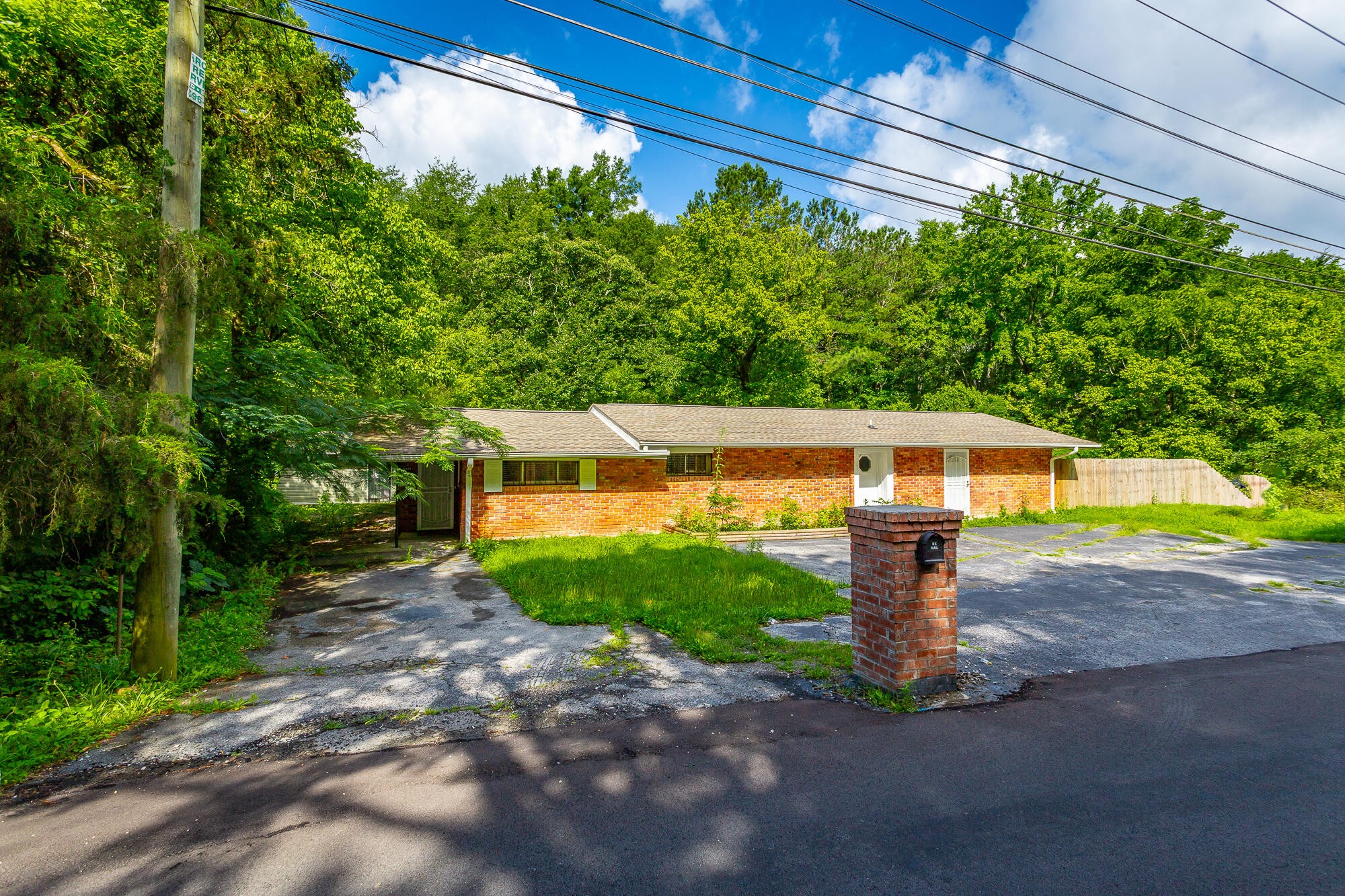 5401 Champion Road Chattanooga, TN 37416 - Photo 45 of 56 a front view of a house with a yard