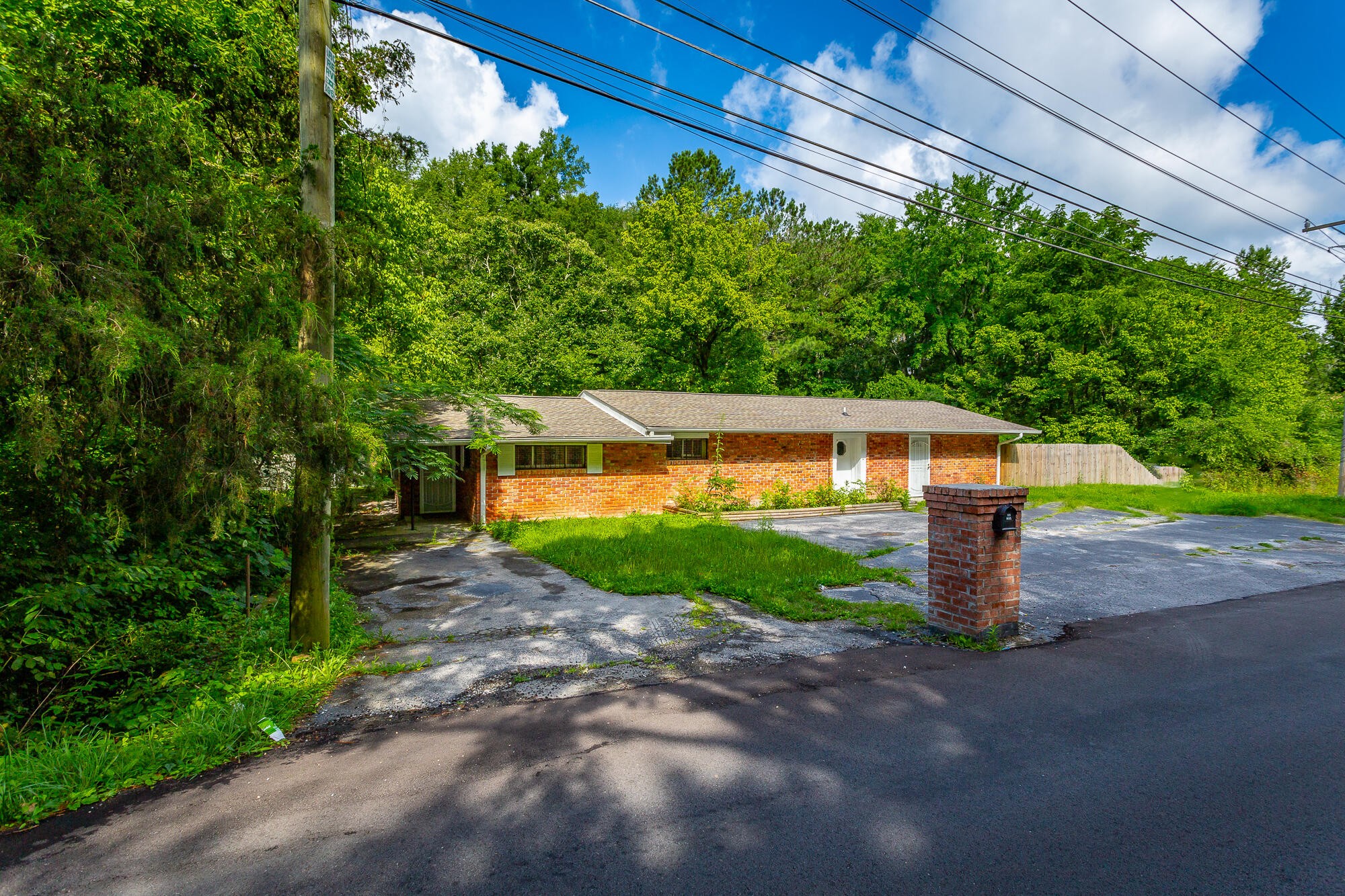 5401 Champion Road Chattanooga, TN 37416 - Photo 46 of 56 a front view of a house with a yard