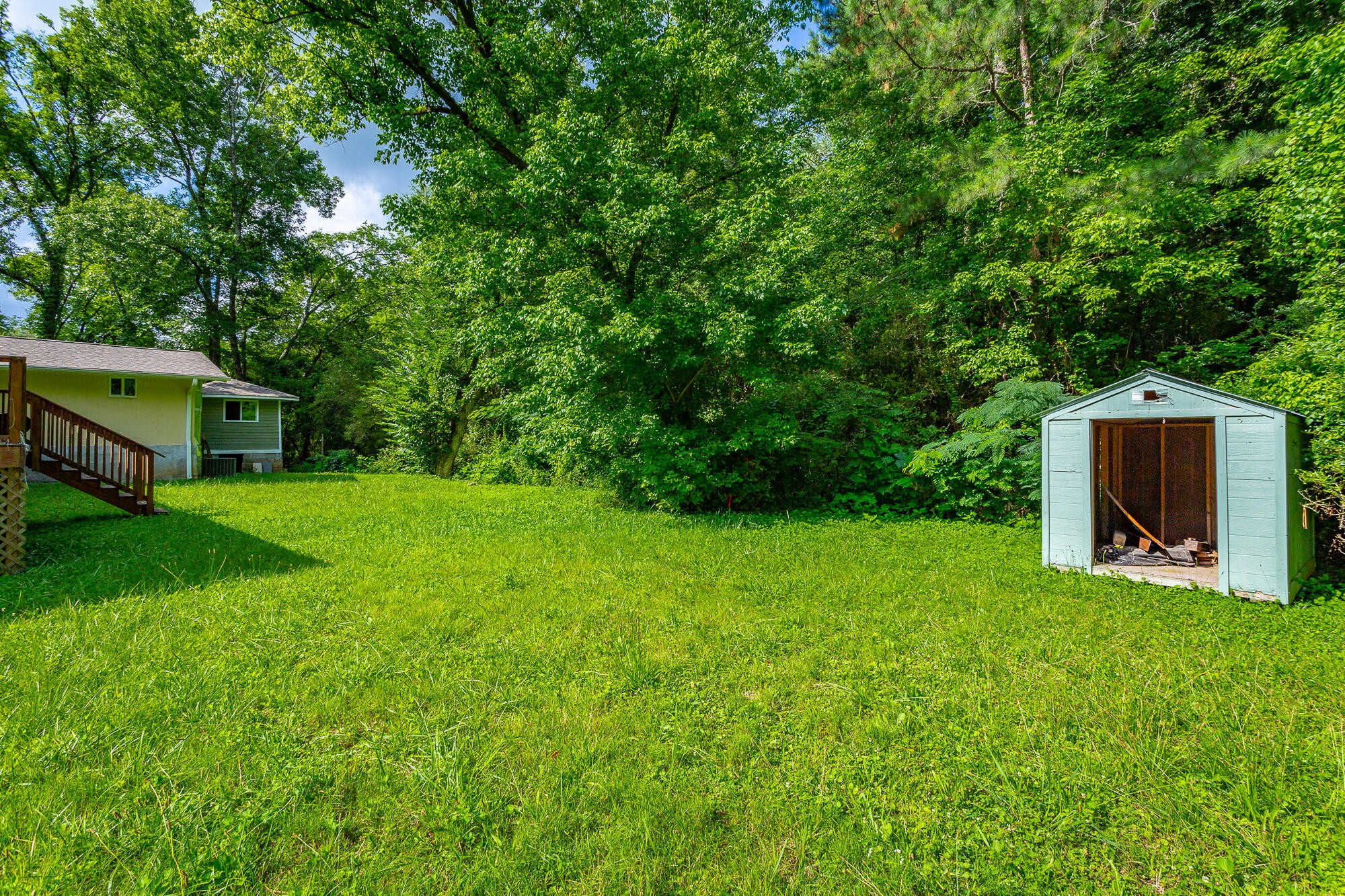 5401 Champion Road Chattanooga, TN 37416 - Photo 50 of 56 a backyard of a house with table and chairs