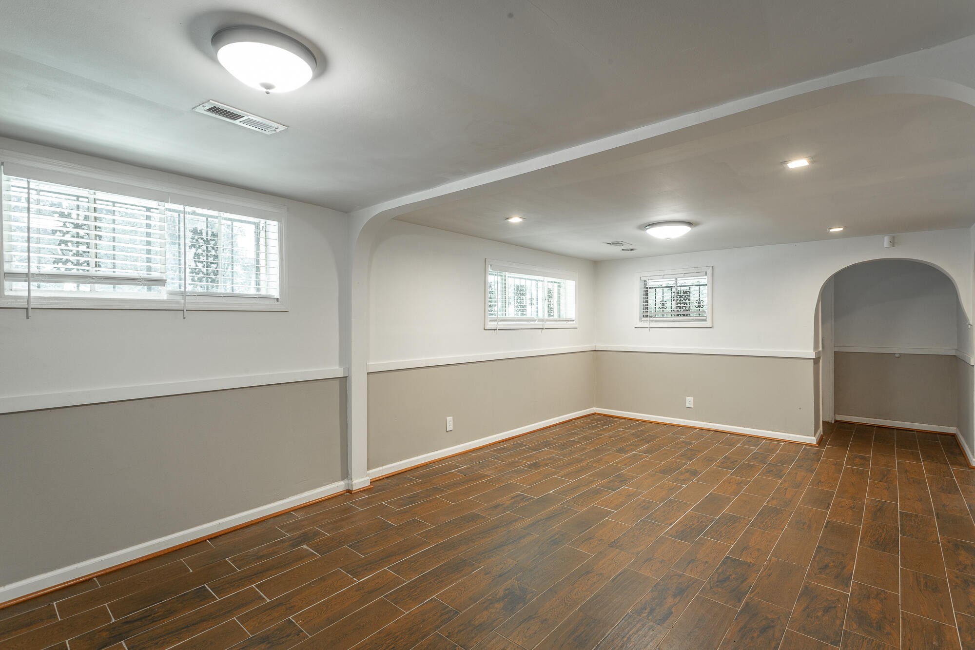5401 Champion Road Chattanooga, TN 37416 - Photo 5 of 56 wooden floor in an empty room with a window