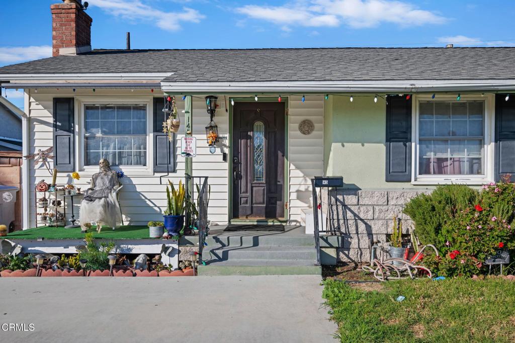 145 Homer Street Oxnard, CA 93033 - Photo 2 of 15 front view of house with a yard