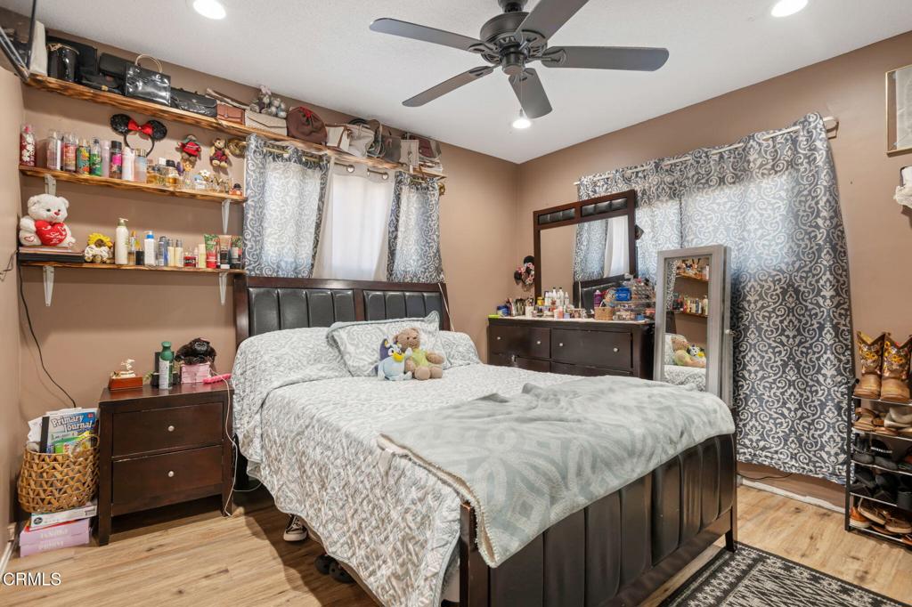 145 Homer Street Oxnard, CA 93033 - Photo 9 of 15 a bedroom with a bed and a window