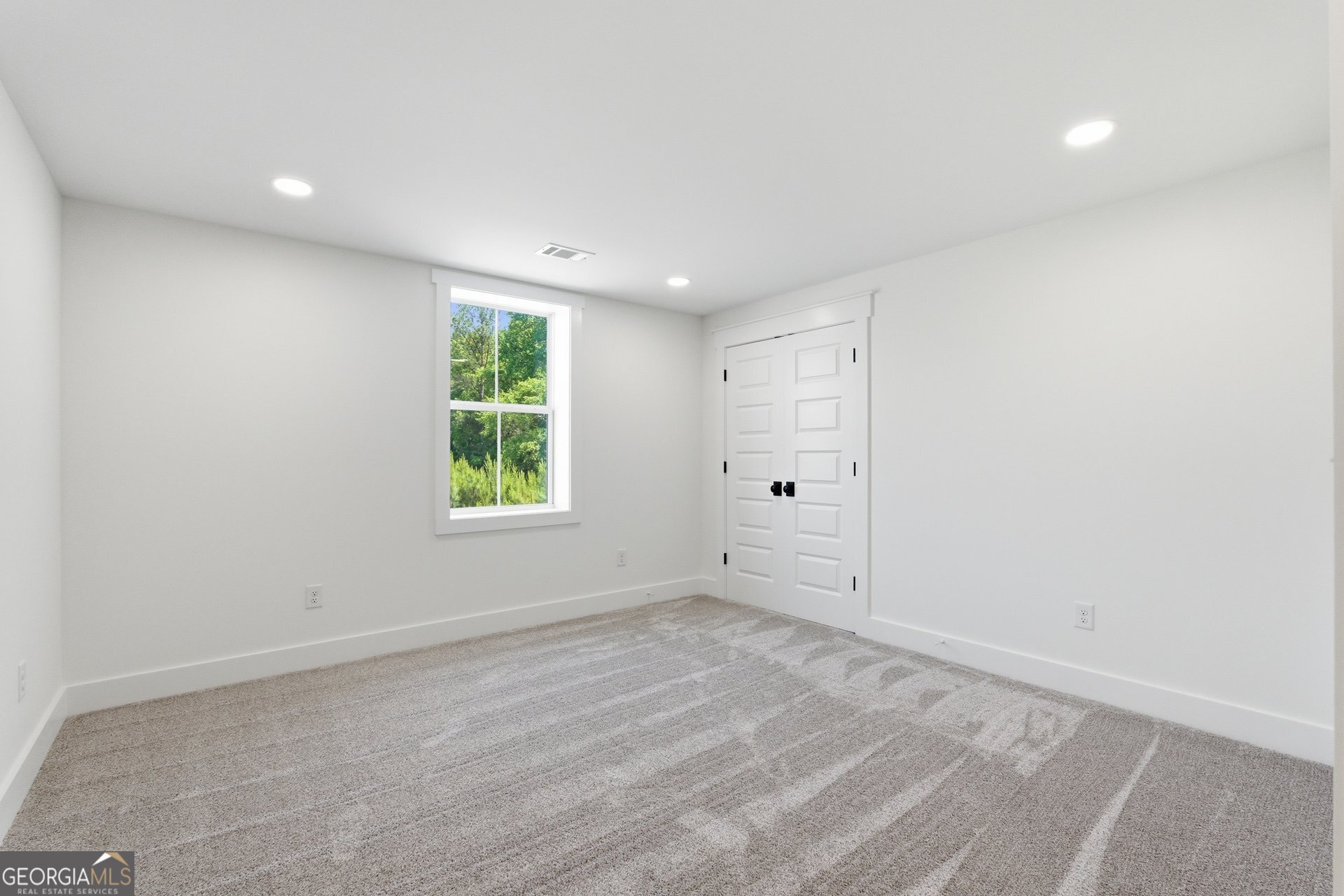 5938 Ridgeway Road Franklin, GA 30217 - Photo 29 of 41 an empty room with windows