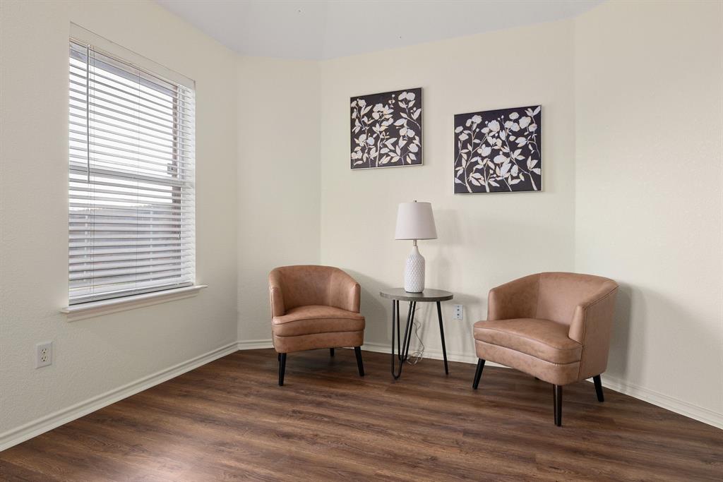 10210 Bent Tree Drive Rowlett, TX 75089 - Photo 11 of 27 a work room with furniture and a window