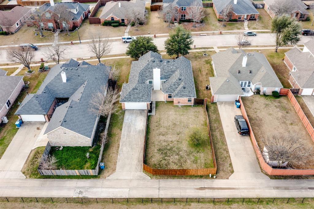 10210 Bent Tree Drive Rowlett, TX 75089 - Photo 25 of 27 an aerial view of residential houses with outdoor space
