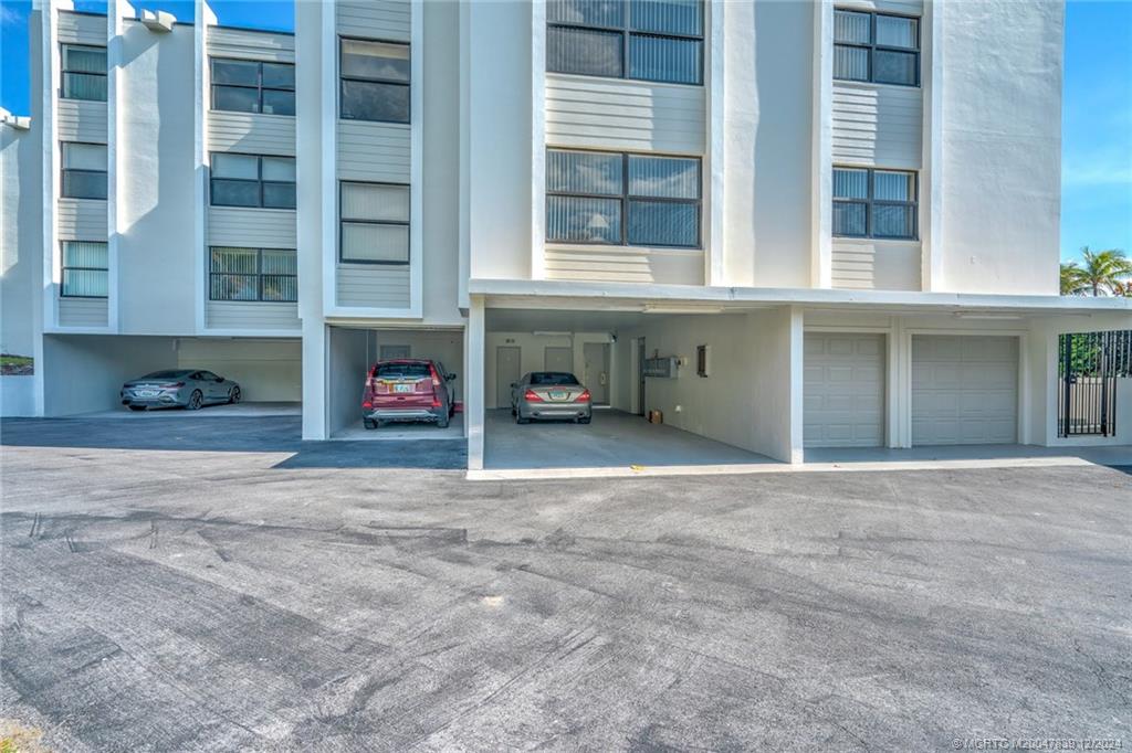 1289 Northeast Ocean Boulevard, Unit 2 Stuart, FL 34996 - Photo 28 of 41 a view of a car garage of the house