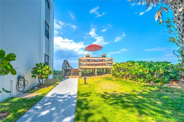 a view of swimming pool with a balcony