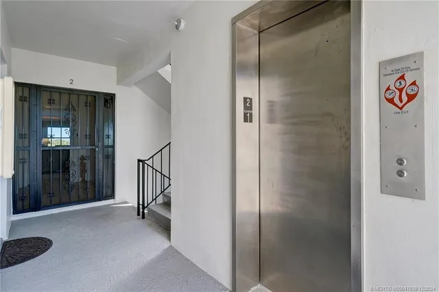 a view of a hallway with elevator