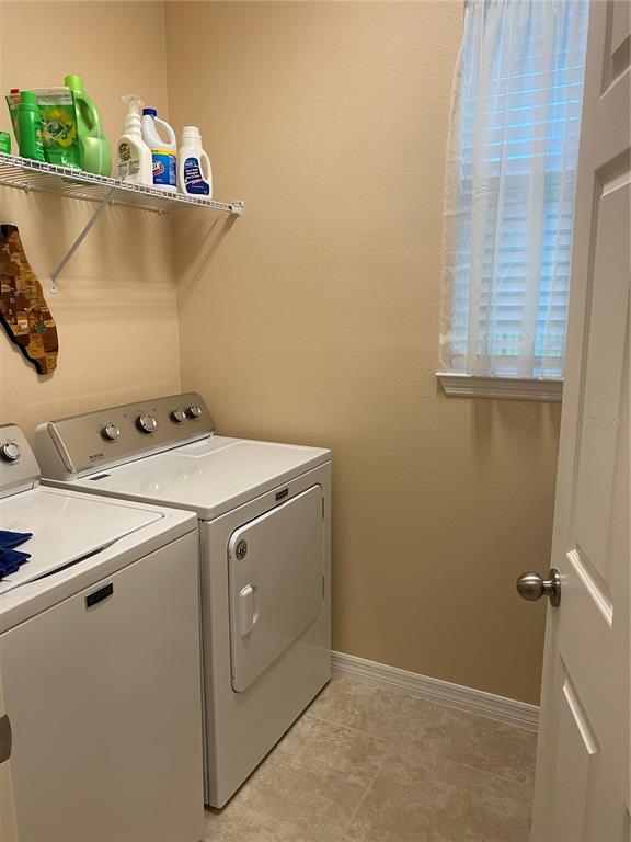 2337 Farnham Drive Ocoee, FL 34761 - Photo 13 of 20 a utility room with dryer and washer