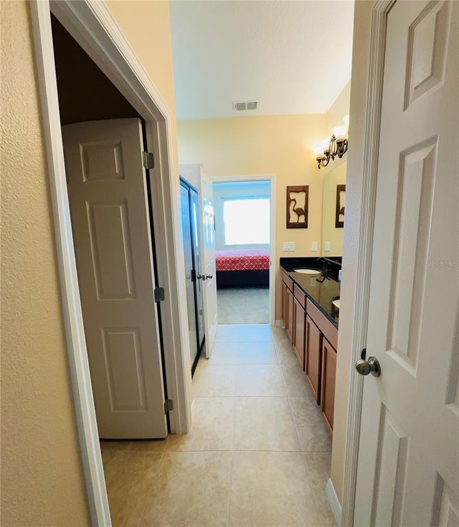 2337 Farnham Drive Ocoee, FL 34761 - Photo 4 of 20 a view of a hallway and a walk in closet