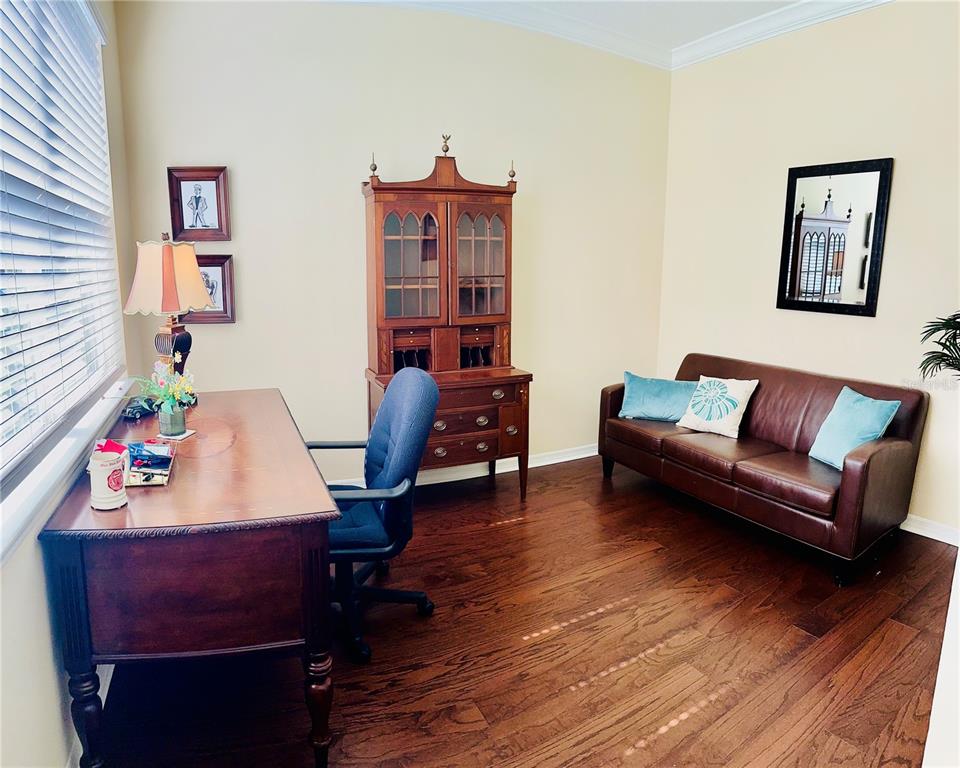 2337 Farnham Drive Ocoee, FL 34761 - Photo 9 of 20 a reading room with furniture and wooden floor