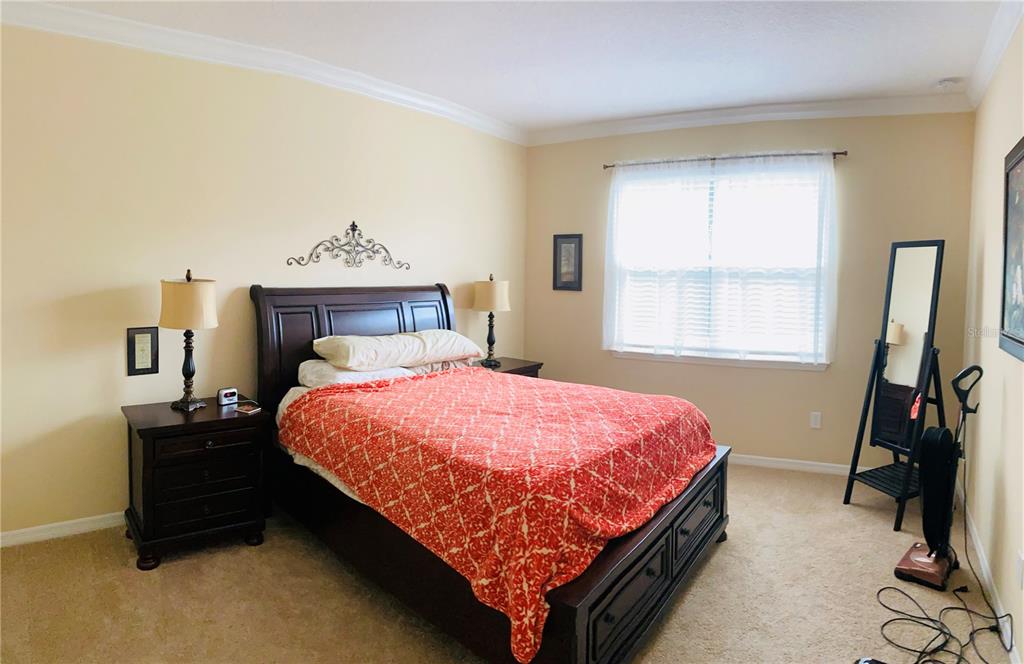 2337 Farnham Drive Ocoee, FL 34761 - Photo 10 of 20 a bedroom with a bed and a window