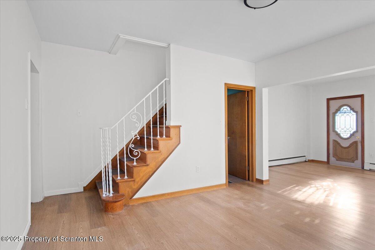 134 Lampman Street Avoca, PA 18641 - Photo 12 of 34 a view of an entryway with wooden floor