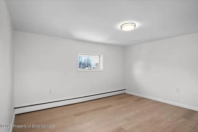 an empty room with a workbench