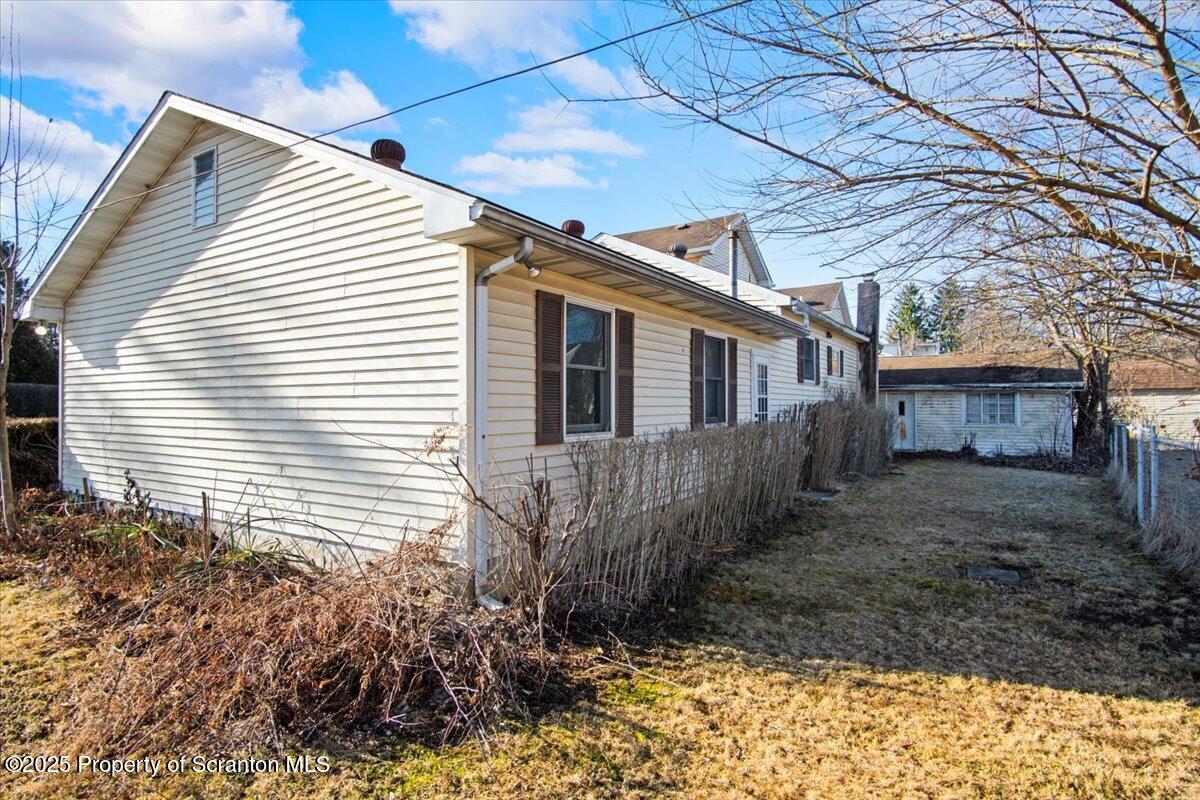 134 Lampman Street Avoca, PA 18641 - Photo 29 of 34 a view of a house with a yard