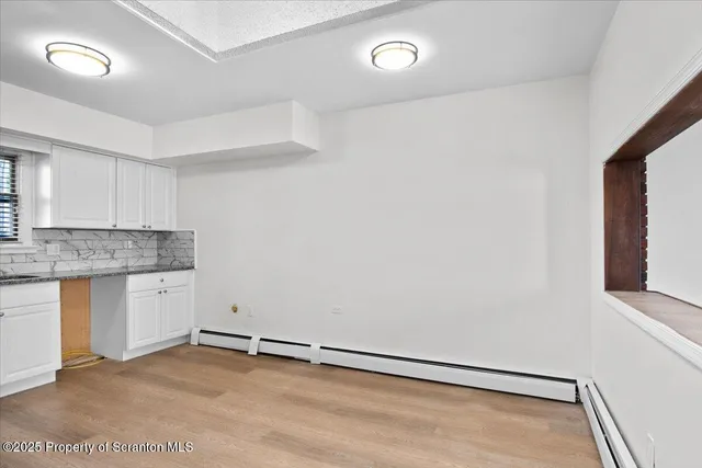 a view of storage and utility room