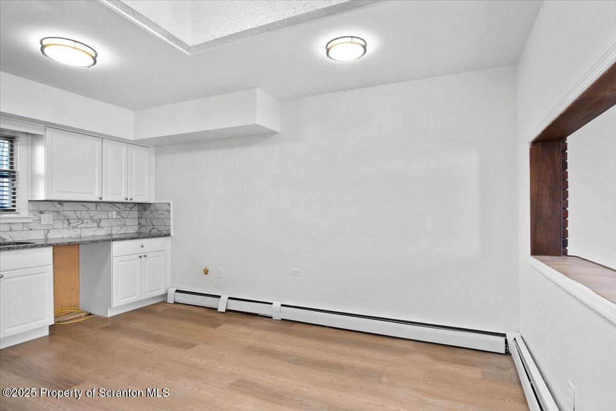 134 Lampman Street Avoca, PA 18641 - Photo 7 of 34 a view of storage and utility room