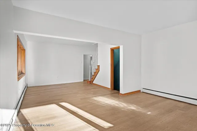 a view of a room with an empty space