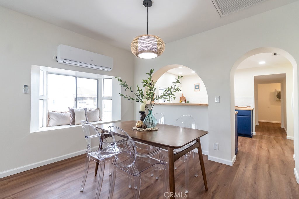 503 Palm Way Needles, CA 92363 - Photo 11 of 50 a view of a dining room with furniture window and wooden floor