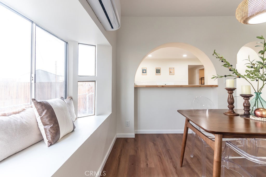 503 Palm Way Needles, CA 92363 - Photo 12 of 50 a living room with a bed furniture and a large window