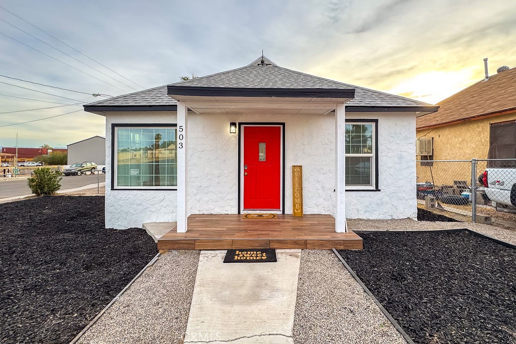 503 Palm Way Needles, CA 92363 - Photo 2 of 50 a front view of a house with garden
