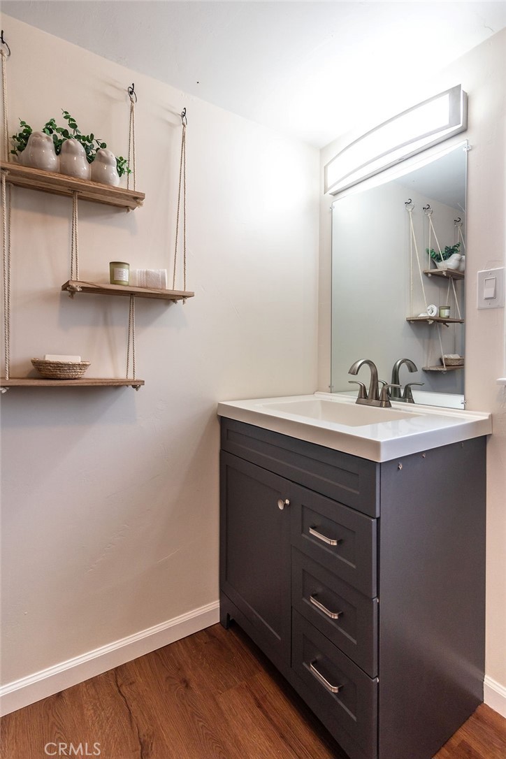 503 Palm Way Needles, CA 92363 - Photo 21 of 50 a bathroom with a sink and a mirror