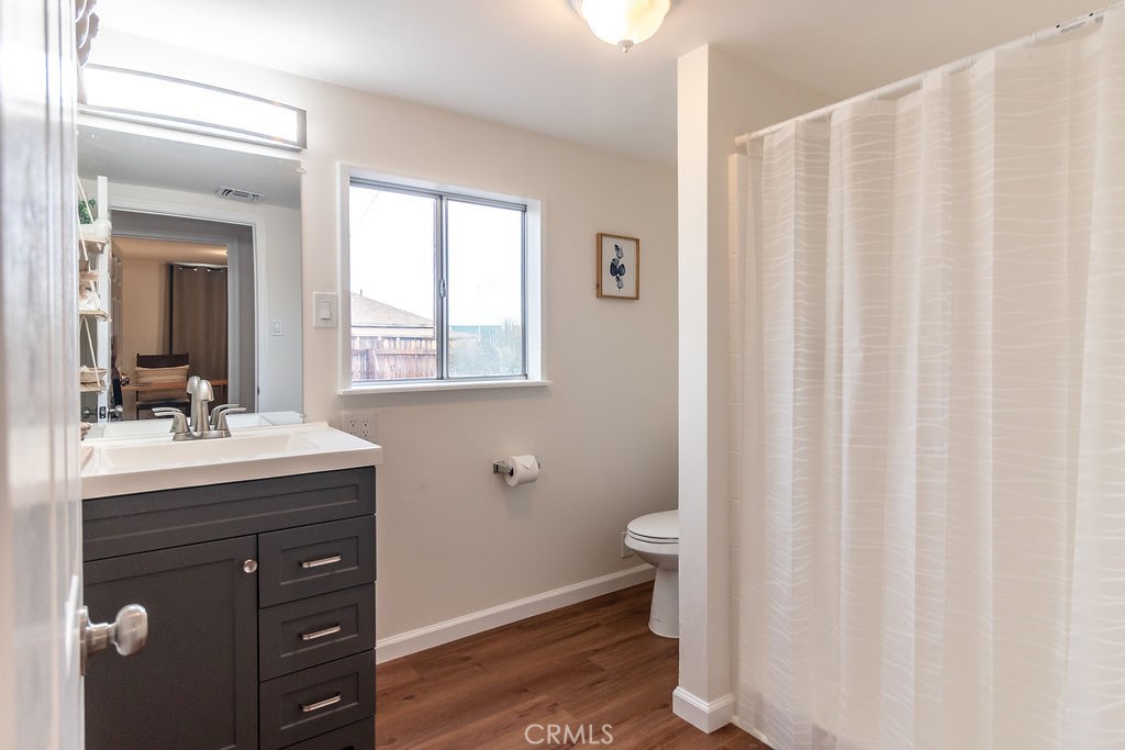 503 Palm Way Needles, CA 92363 - Photo 24 of 50 a bathroom with a sink a toilet and shower