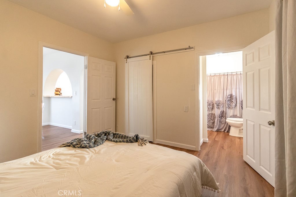 503 Palm Way Needles, CA 92363 - Photo 34 of 50 a bedroom with a bed and a window