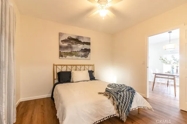 a bathroom with a shower curtain and a sink