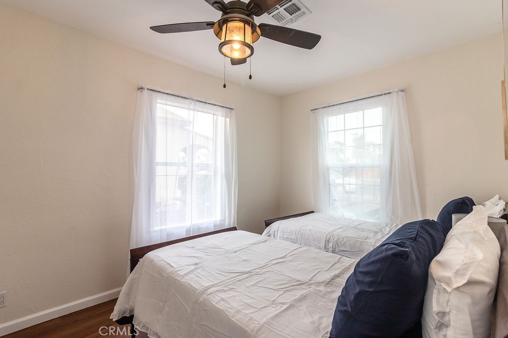 503 Palm Way Needles, CA 92363 - Photo 40 of 50 a bedroom with a bed and a window