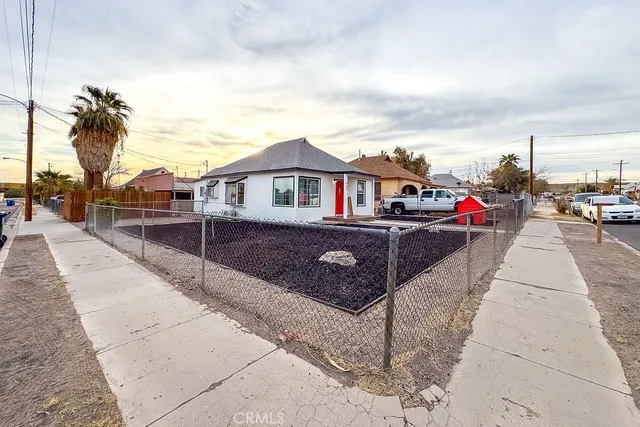 a view of front of house with a pathway