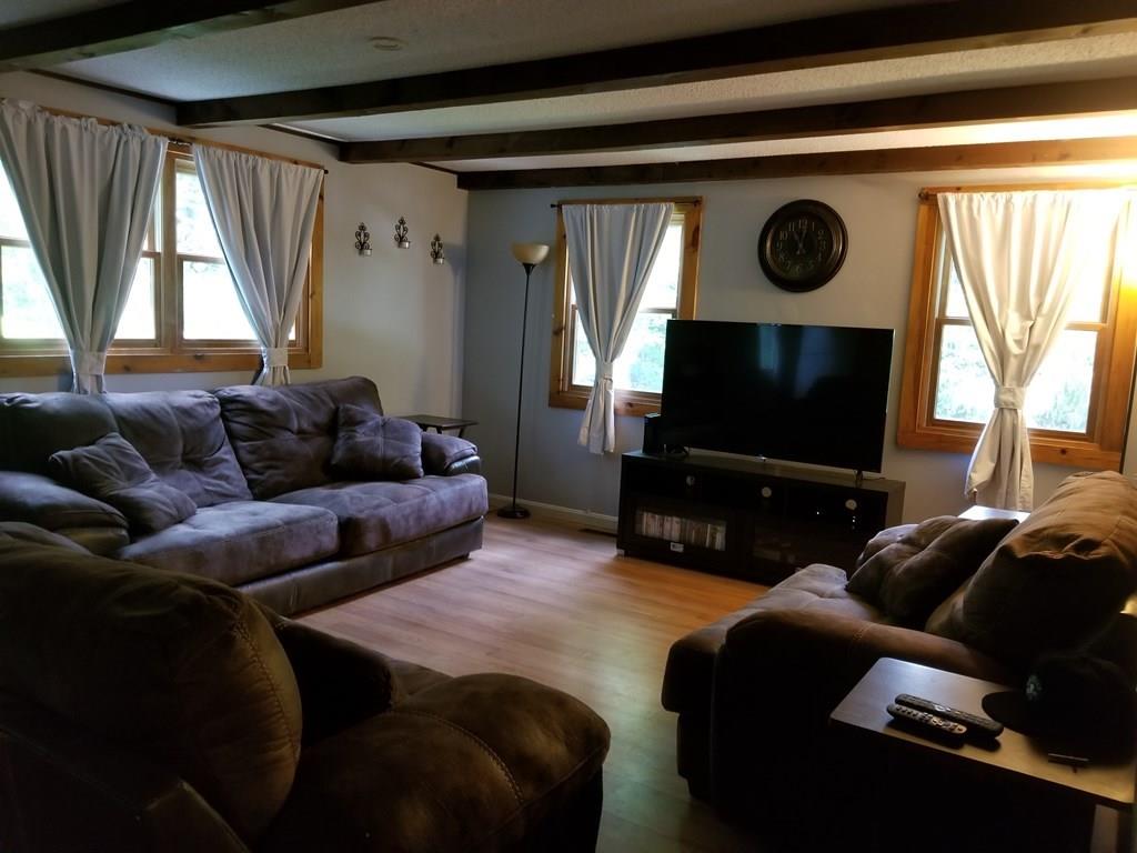 381 North Brookfield Road Barre, MA 01005 - Photo 4 of 23 a living room with furniture and a flat screen tv