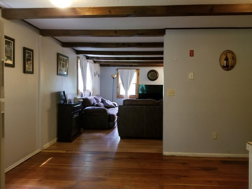 381 North Brookfield Road Barre, MA 01005 - Photo 8 of 23 a living room with furniture and a mirror