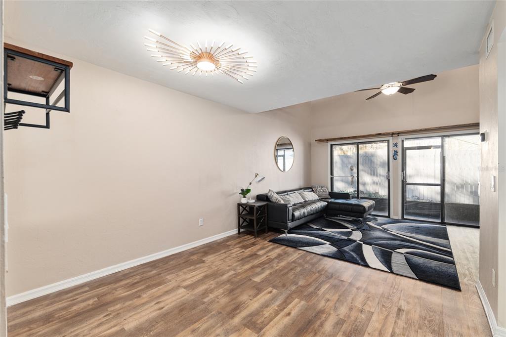 7200 Southwest 8th Avenue, Unit E29 Gainesville, FL 32607 - Photo 12 of 47 a living room with furniture