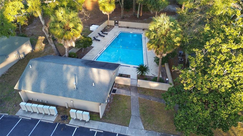 7200 Southwest 8th Avenue, Unit E29 Gainesville, FL 32607 - Photo 45 of 47 a view of balcony with wooden floor