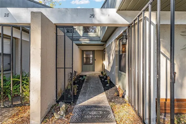 a view of a entryway door front of house