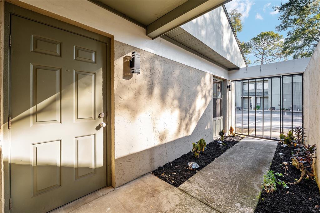 7200 Southwest 8th Avenue, Unit E29 Gainesville, FL 32607 - Photo 9 of 47 a front view of a house