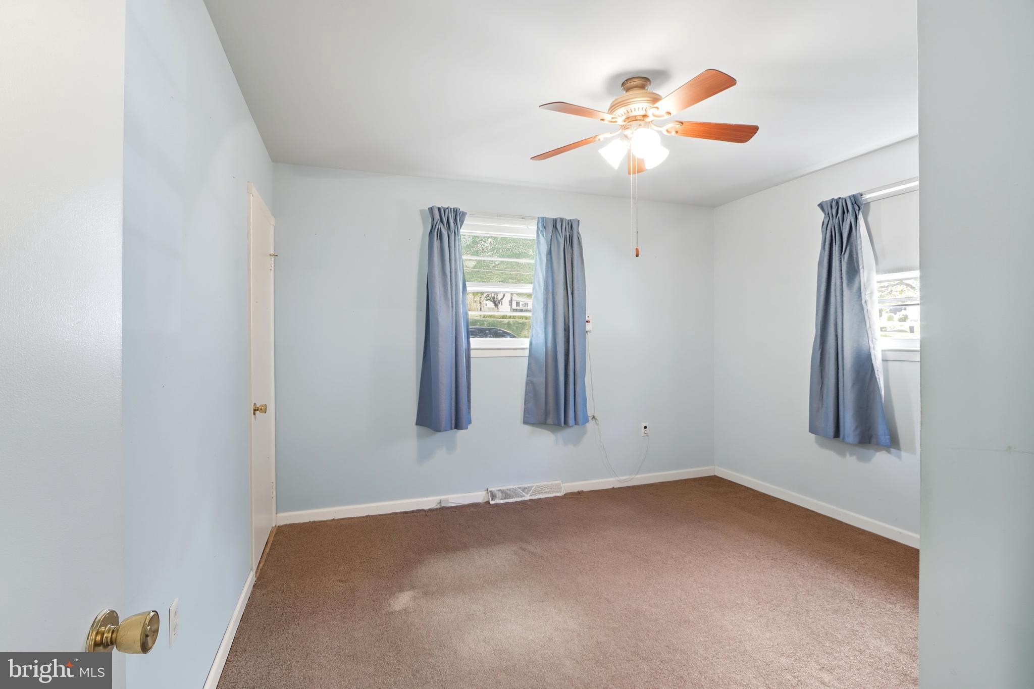 60 South Ritters Lane Owings Mills, MD 21117 - Photo 12 of 31 Main Level Bedroom w/ natural light